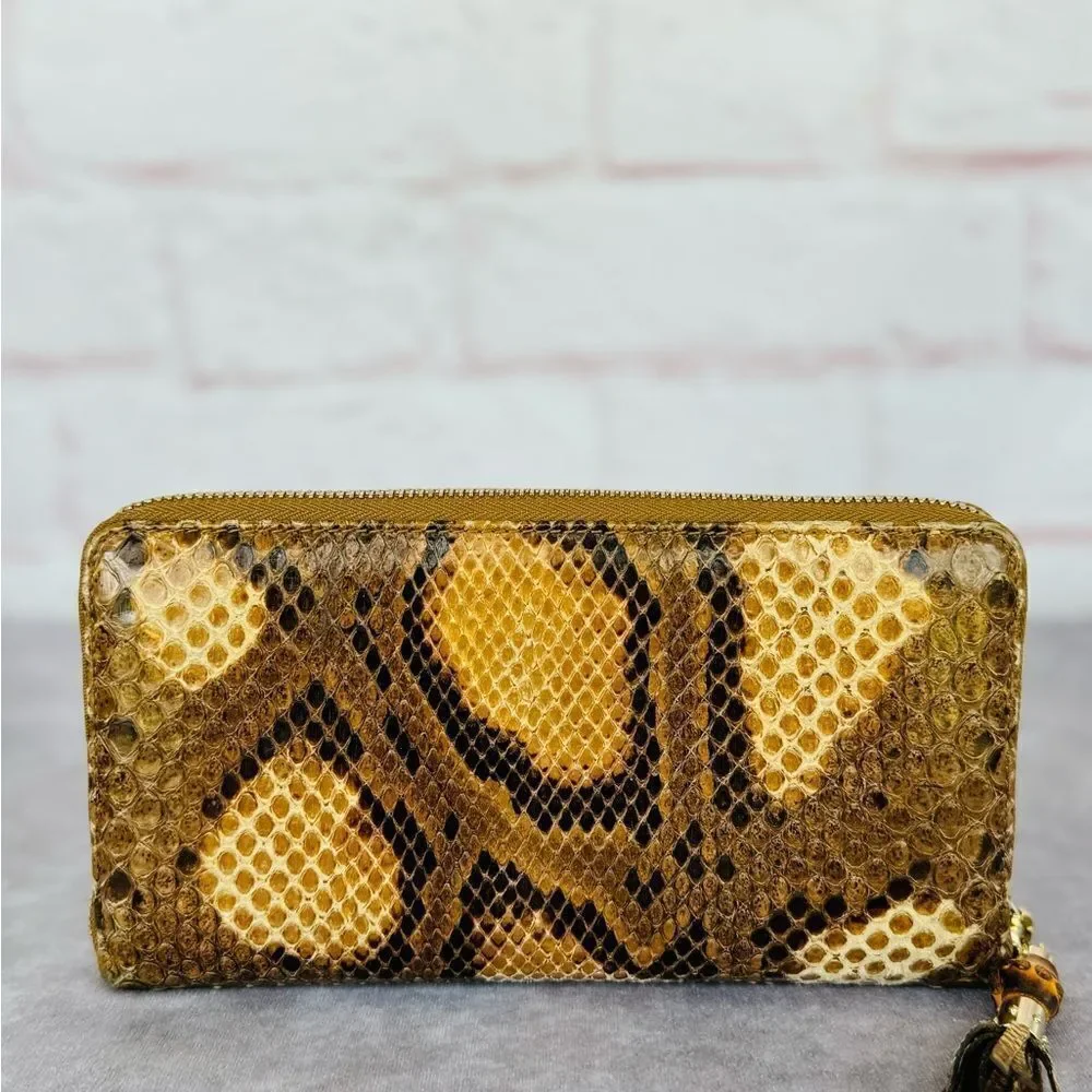 Gucci Python Embossed Tassel Zippy Wallet - Picture 2 of 16